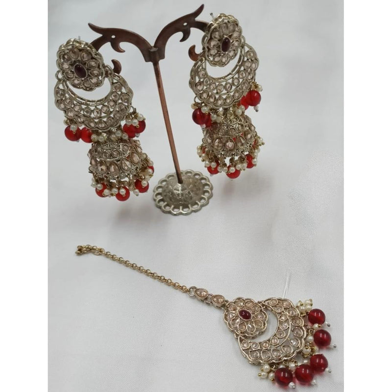 Akruti Collection Gold Plated Crystal Stone Earrings With Maangtikka