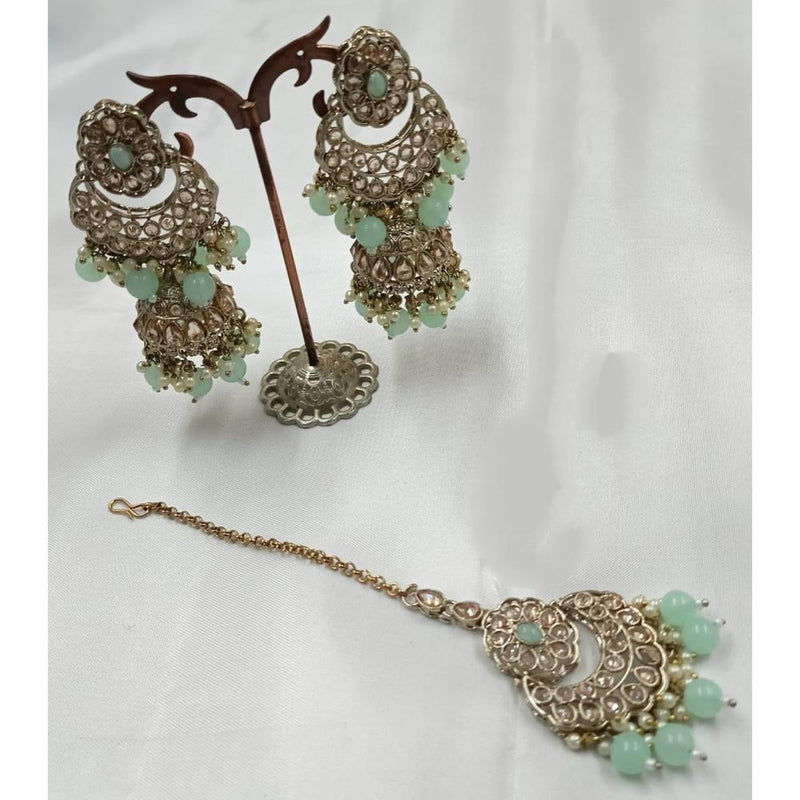 Akruti Collection Gold Plated Crystal Stone Earrings With Maangtikka