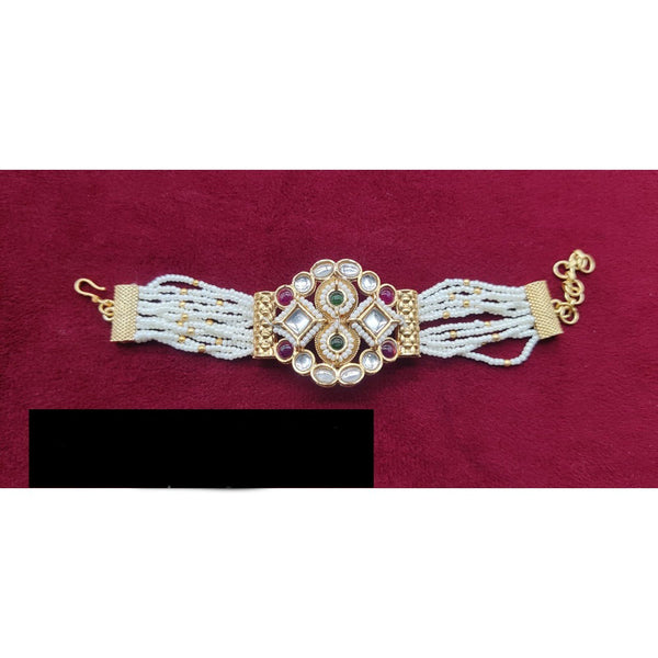 Akruti Collection Gold Plated Kundan Stone And Pearls Adjustable Bracelet