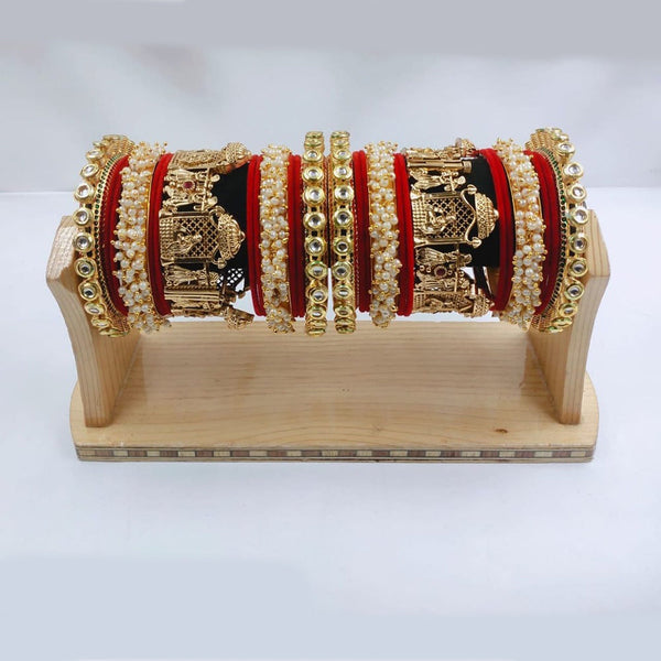 Akruti Collection Gold Plated Kundan Stone And Pearl Bangles Set