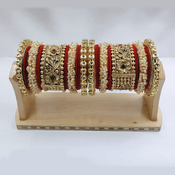 Akruti Collection Gold Plated Kundan Stone And Pearl Bangles Set