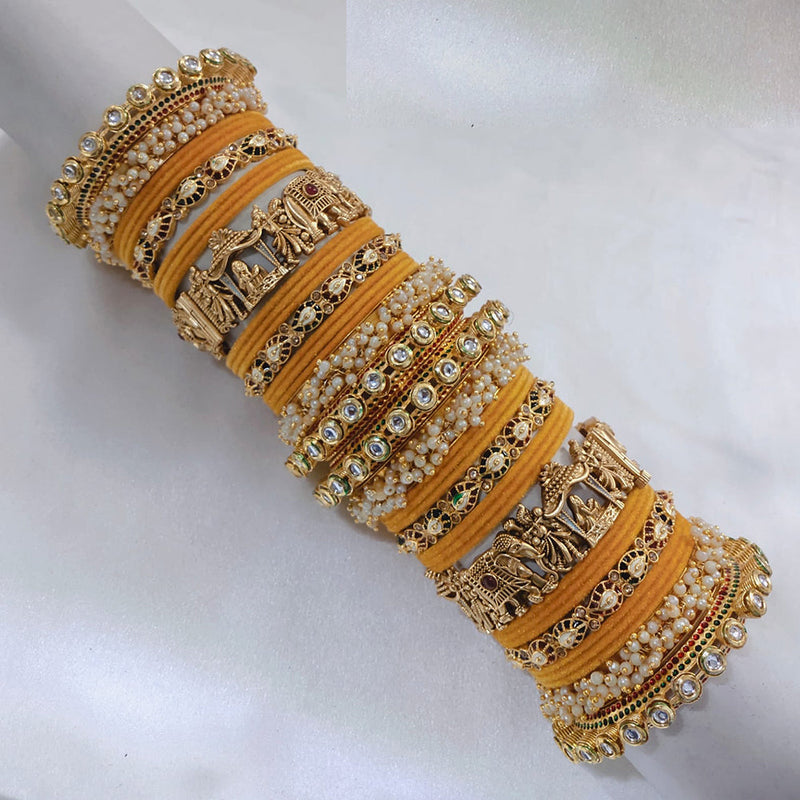 Akruti Collection Gold Plated Pota Stone And Pearl Meenakari Velvet Bangles Set