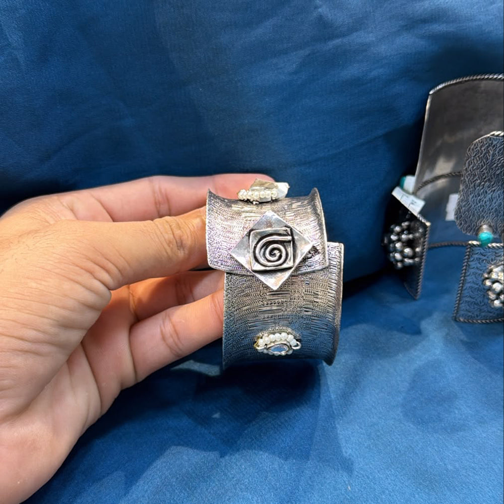 Akruti Collection Designer Oxidised Plated Pota Stone And Pearl Openable Kada