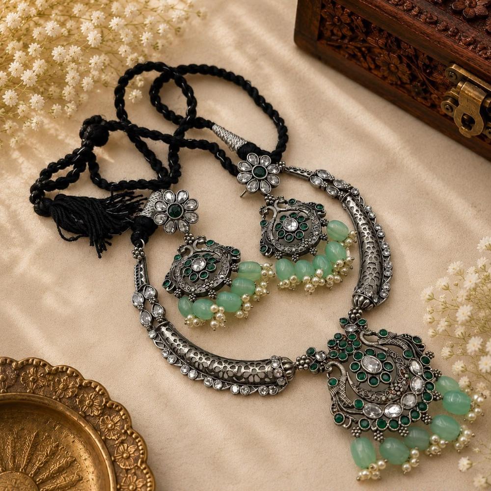 Akruti Collection Beautiful Oxidised Pota Stone And Pearl Jewellery Set