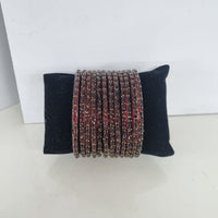 Akruti Collection Graceful Raindrop Glass Bangles Set for Women