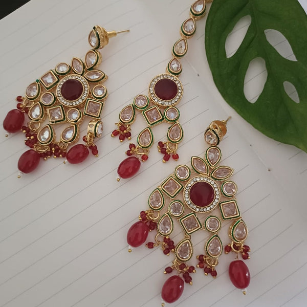Exotica Collection Gold Plated Reveres AD Earring With Maangtikka