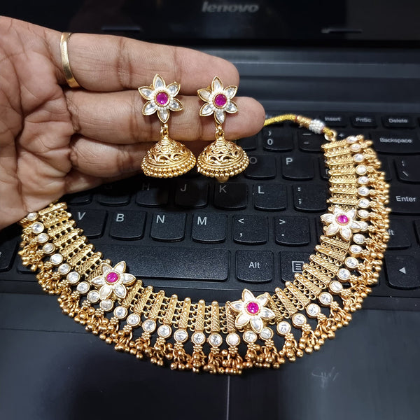 JCM Gold Plated Kundan Stone And Pearls Necklace Set