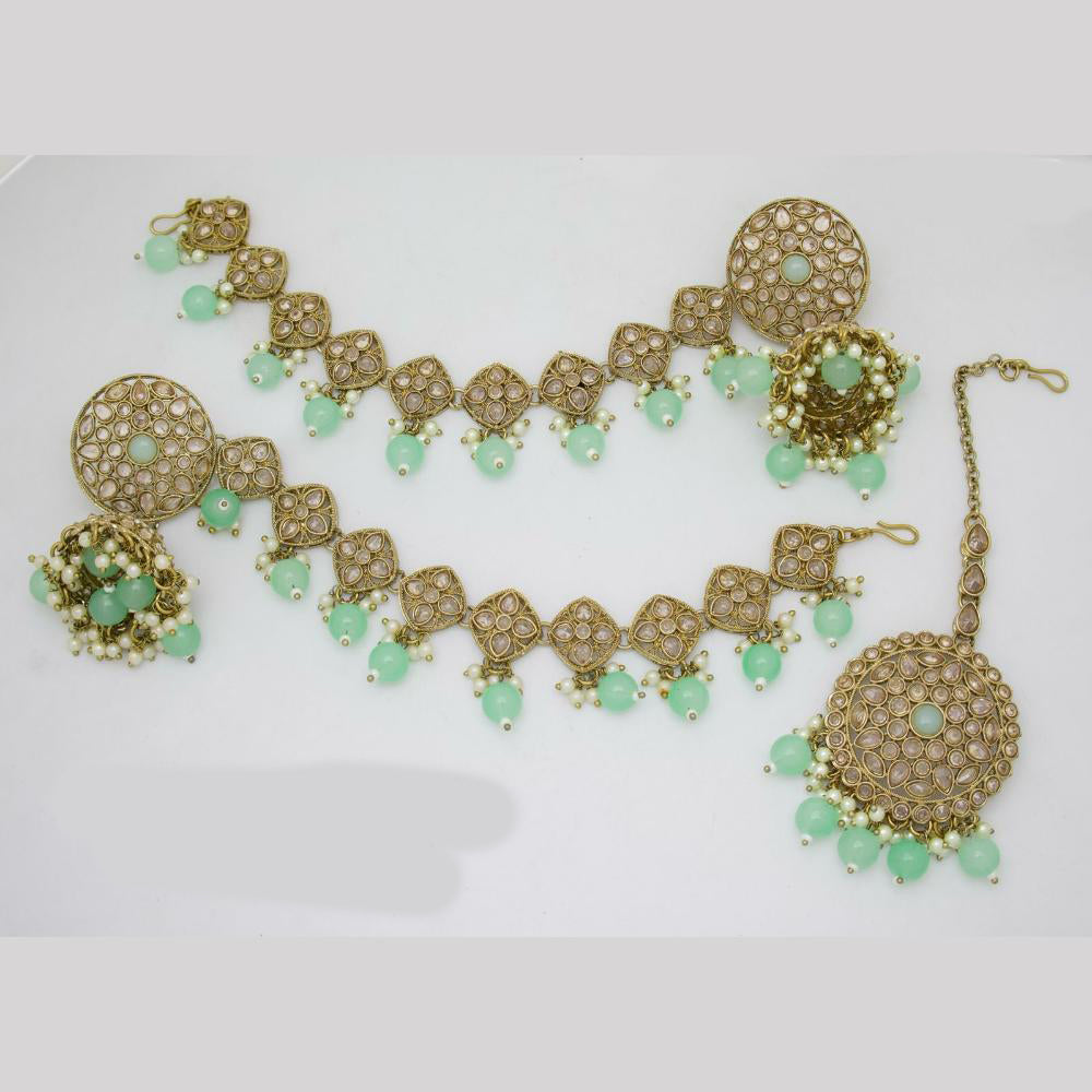 JCM Gold Plated Crystal Stone And Beads Jhumki With Maangtikka