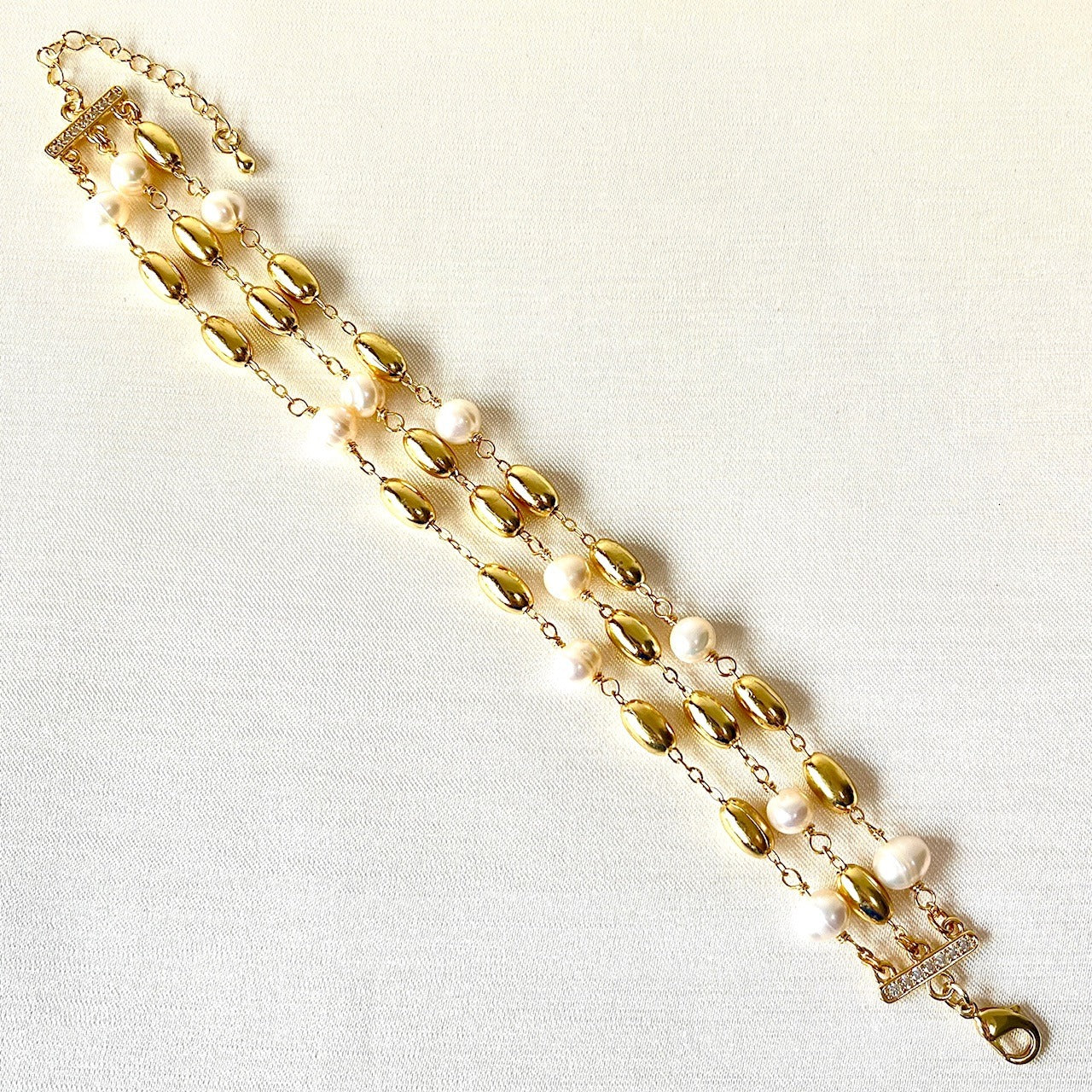 Jewel Treatzz Adorable Everyday Wear 3 Line Gold Plated & Gold Beads Fashion Bracelet