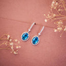 Jewel Treatzz Rhodium Plated, Pear Shaped Emerald Doublet Stone & Cubic Zirconia's Dangler Earrings