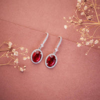 Jewel Treatzz Rhodium Plated, Pear Shaped Emerald Doublet Stone & Cubic Zirconia's Dangler Earrings