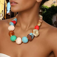 Tarohi Jewels Multicolor Resin Beaded Statement Necklace with Gold Flower Detail  