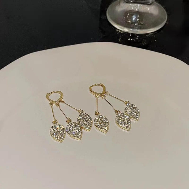 Glam Jewellery Gold Electroplated Rhinestone Studded High End Leaf Tassel Earrings