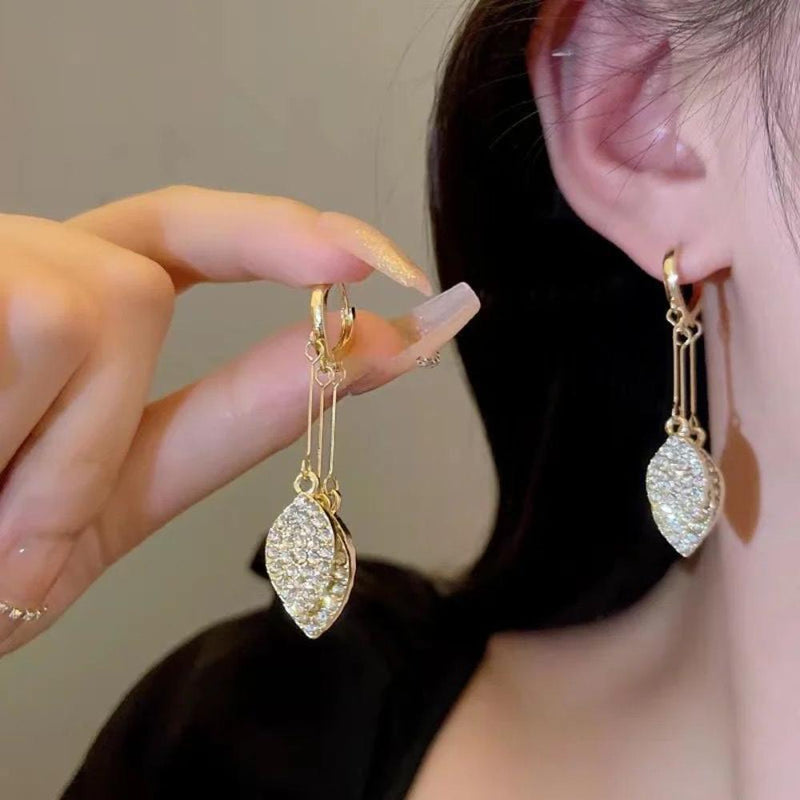 Glam Jewellery Gold Electroplated Rhinestone Studded High End Leaf Tassel Earrings