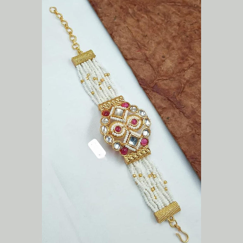 Abhinandan Gold Plated Kundan Stone And Pearls Adjustable Bracelet