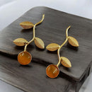 Maharani Jewels Gold Plated Pota Stone Traditional Dangler Earrings