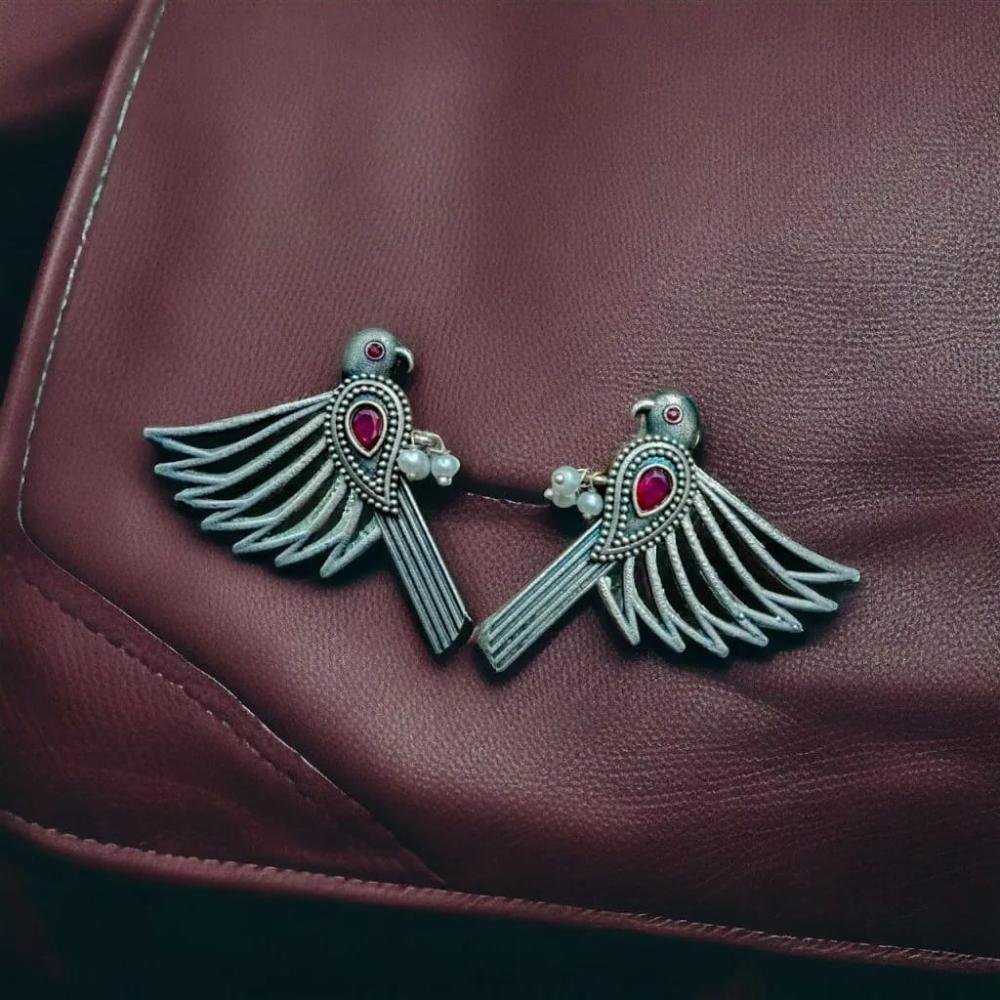 Maharani Jewels Inspired Oxidised Plated Pota & Pearl Detailing Bird Dangler Earrings