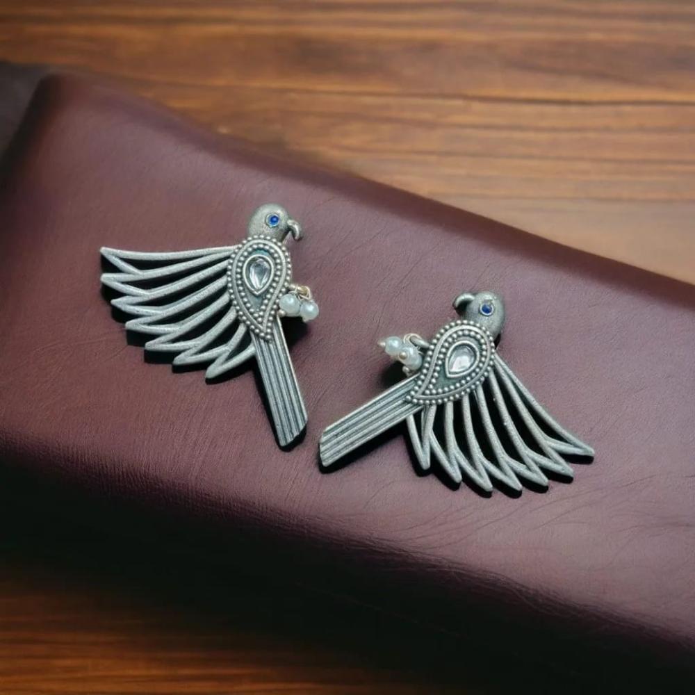 Maharani Jewels Inspired Oxidised Plated Pota & Pearl Detailing Bird Dangler Earrings