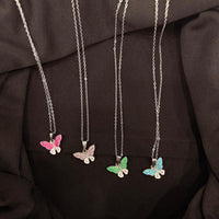 VM Imitation Delicate Butterfly Charm Chain Pendant