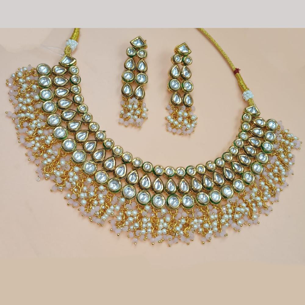 NAFJ Gold Plated Kundan Stone And Pearls Necklace Set