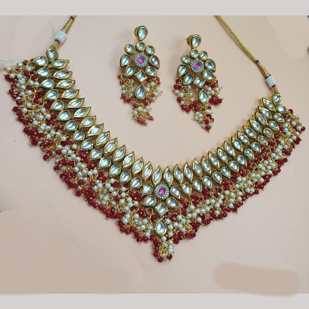 NAFJ Gold Plated Kundan Stone And Pearls Necklace Set