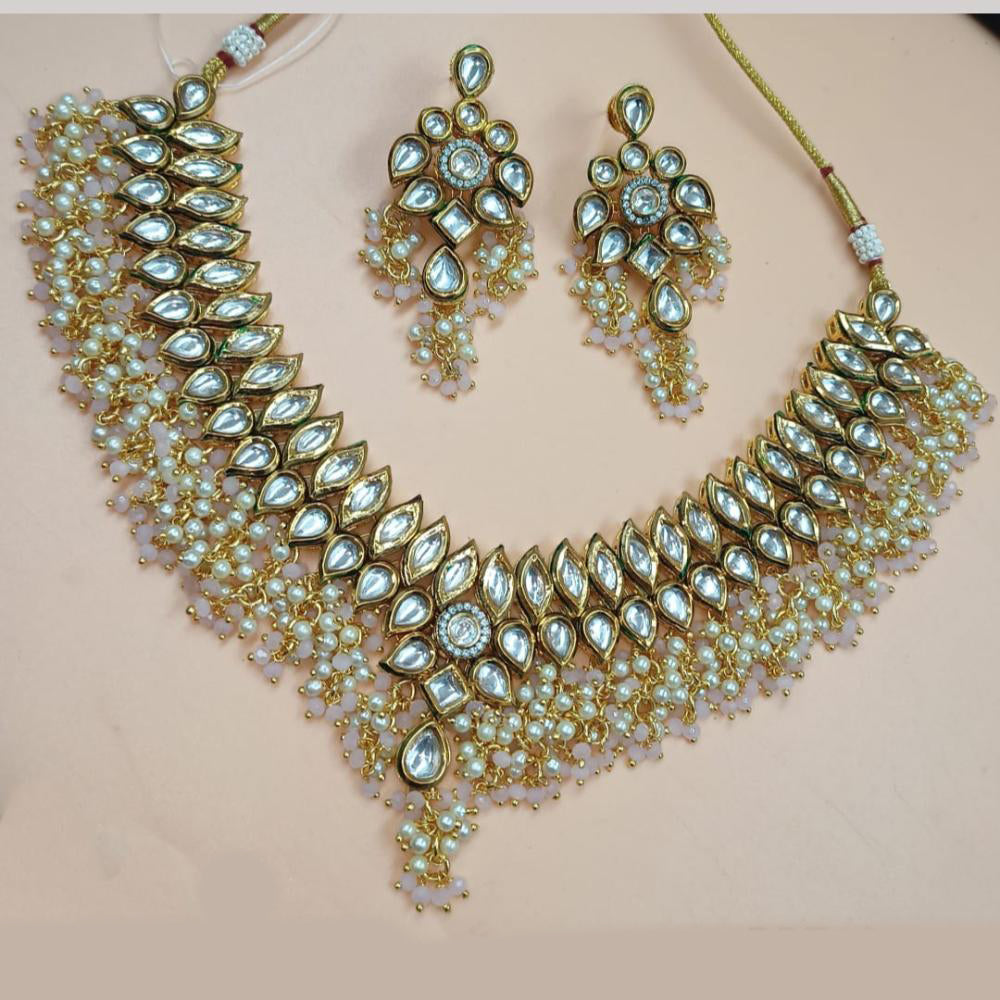 NAFJ Gold Plated Kundan Stone And Pearls Necklace Set