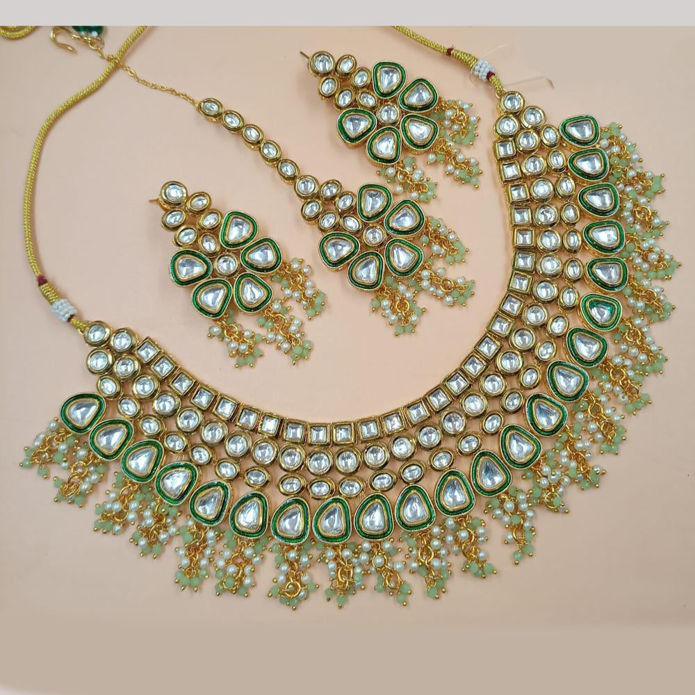 NAFJ Gold Plated Kundan Stone And Pearls Necklace Set