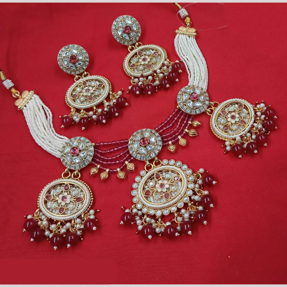NAFJ Gold Plated Kundan And Pota Pearl Meenakari Necklace Set