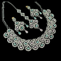 NAFJ Glamorous Crystal Stone And Austrian Stone Designer Necklace Set With Maangtikka