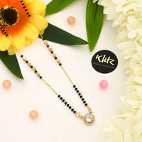 Klitz Sparkling Austrian Stone And Graceful Black Beads Mangalsutra 