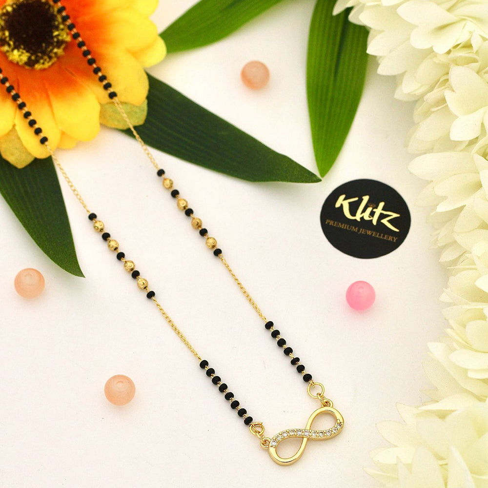 Klitz Sparkling Austrian Stone And Graceful Black Beads Mangalsutra