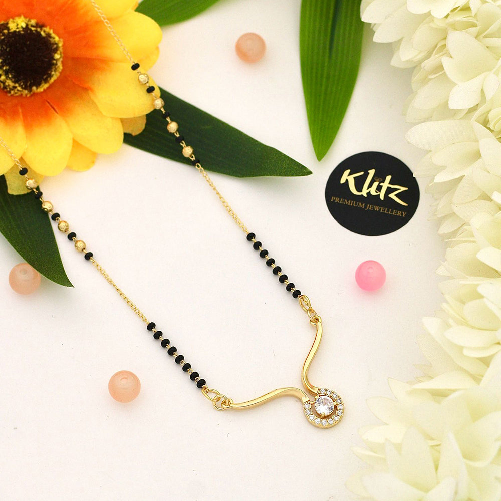 Klitz Sparkling Austrian Stone And Graceful Black Beads Mangalsutra