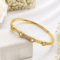 Klitz Pack Of 12 Gold Plated Austrian Stone Openable Kada