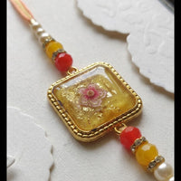  Dhirish International Thread Rakhi for a Memorable and Spiritually Rich Celebration 