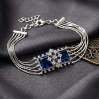 Dhirish International Elegant Silver Austrian Stone Bracelet