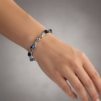 Urthn Silver Tone Oval Shape Evil Eye Adjustable Bracelet for Women(Pack of 12)