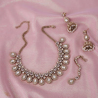 Saloni Fashion Jewellery Glamorous Oval Shape Uncut Kundan Stone Gold Plated Brass Choker Necklace Set With Maang Tikka For Women and Girls