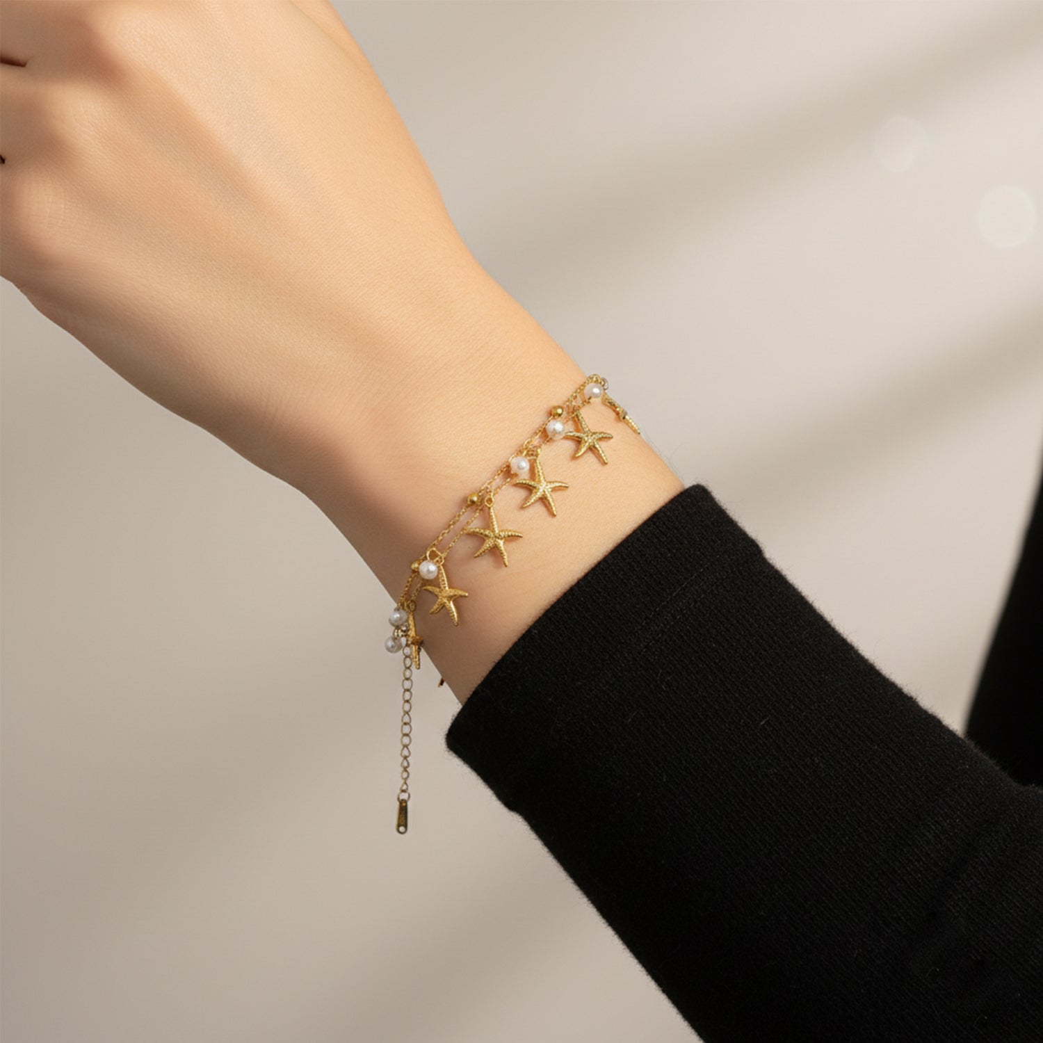 Etnico Gold Plated Fashion Stylish Starfish Charm Bracelet for Women