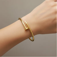Etnico Gold Plated Fashion Stylish Nail Design Bracelet for Women