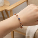 Etnico Rose Gold Plated Fashion Stylish Evil Eye Cable Bracelet with Magnetic Lock for Women
