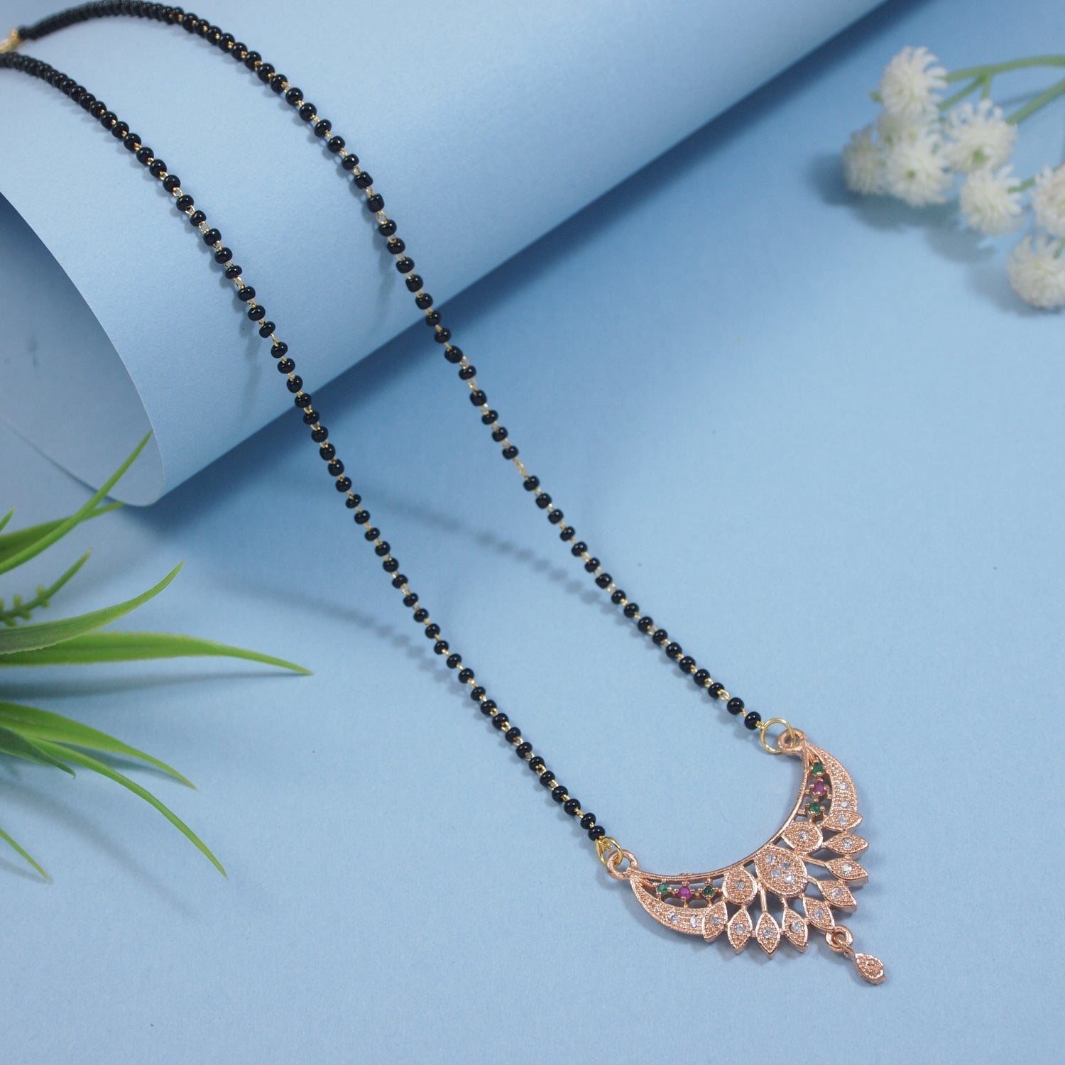 Etnico Rose Gold Plated Traditional Single Line CZ American Diamond Pendant with Black Bead Long Chain Mangalsutra for Women