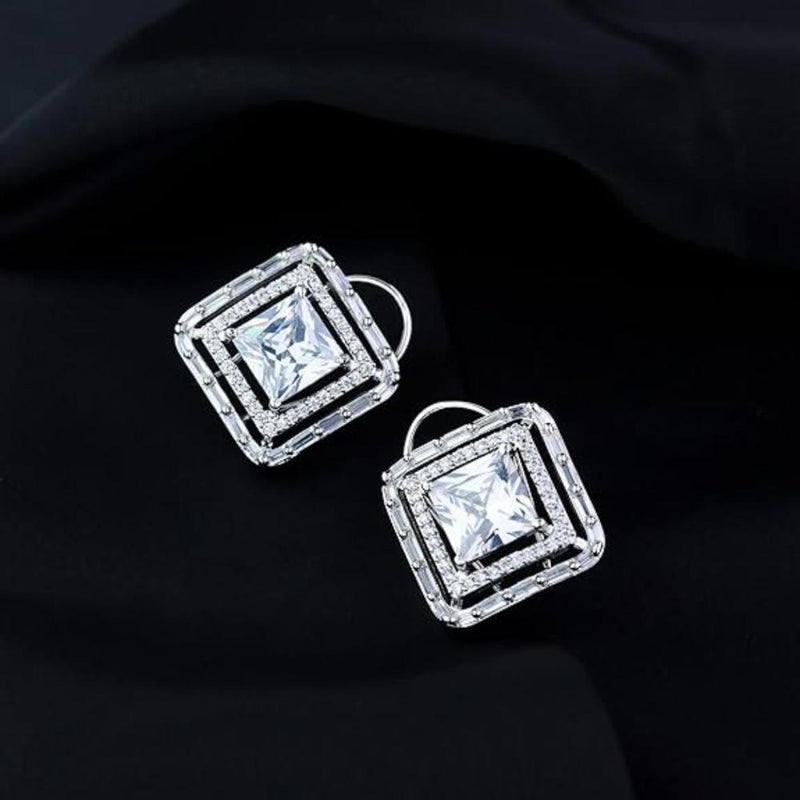 Etnico Silver Plated Traditional CZ American Diamond Stud Earrings for Women (E3071ZW)