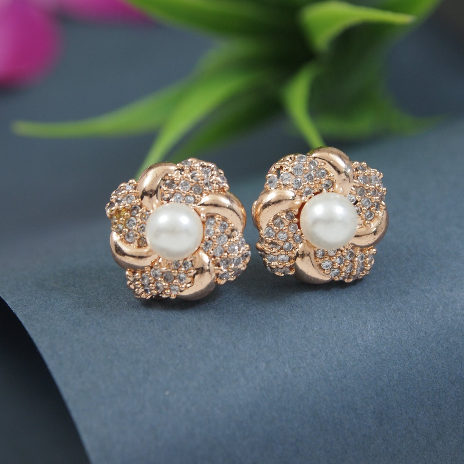 Etnico Latest Stylish Rose Gold Plated CZ American Diamond Stud Earrings For Women