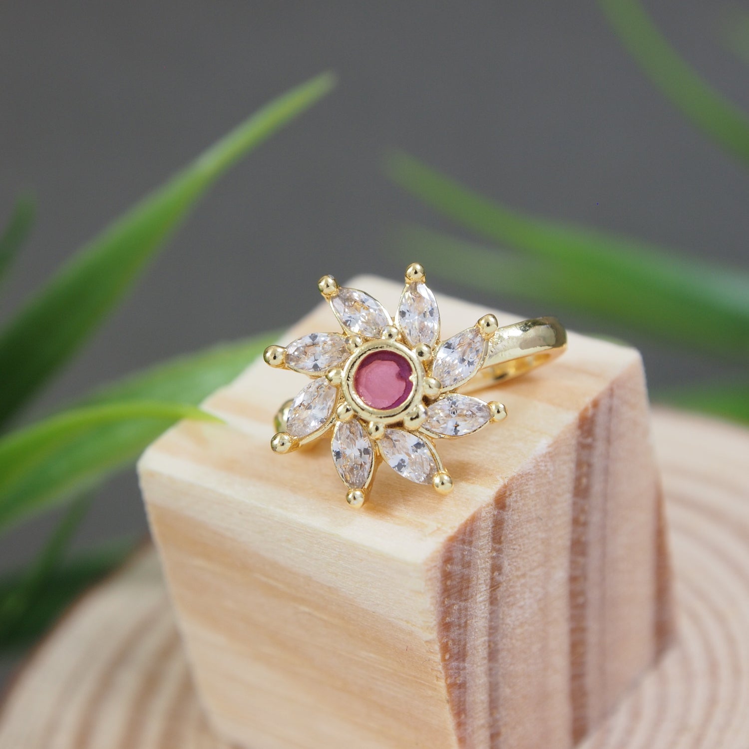 Etnico Gold Plated Floral Shaped Cubic Zirconia American Diamond Clip On Non Piercing Pressing Type Nose Pin, Stud For Women