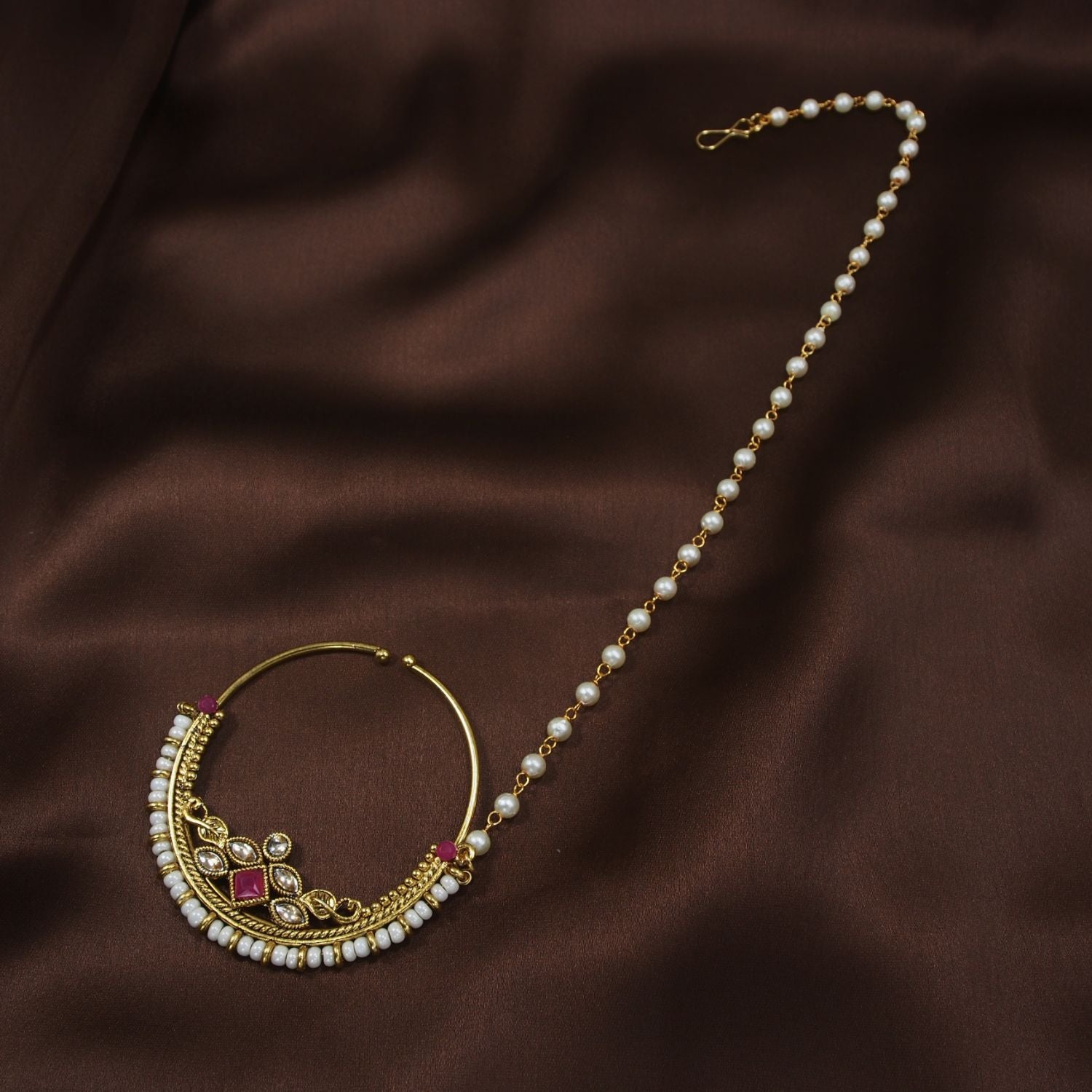 Etnico 18k Gold Plated Traditional Ethnic Bridal Nose Ring/Nath without piercing with Pearl Chain Encased with Pearl Stone for Women/Girls (NL38Q)