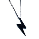 Mahi Black Gunmetal Plated Lightning Bolt Shaped Zig Zag Pendant Necklace for Men and Women  (PS1101883B)r Women (PS1101886RRed)