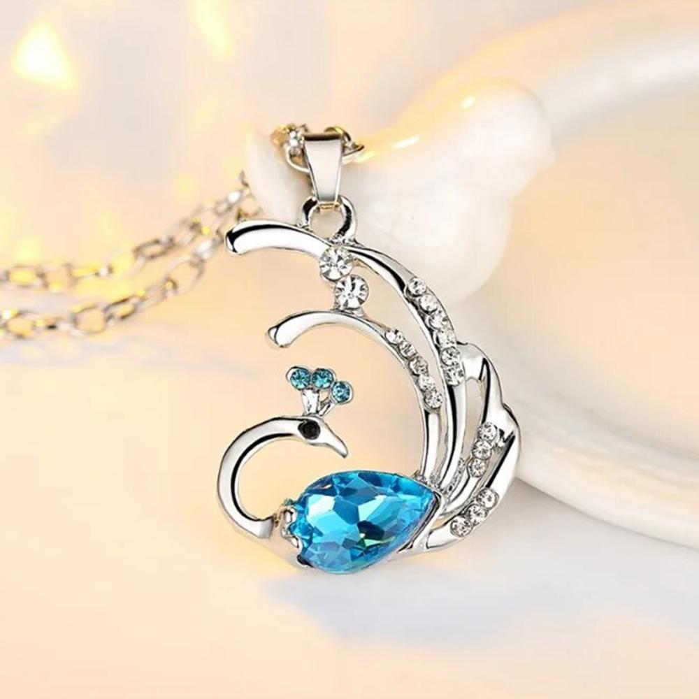 Mahi Dancing Peacock Shaped-Pendant Necklace with Aqua Blue and White Crystals for Women  (PS1101885R)