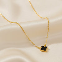 Mahi Black Clover Pendant Necklace with Beaded Edge on Gold Tone Chain Pendant for Women (PS1101972GBla)