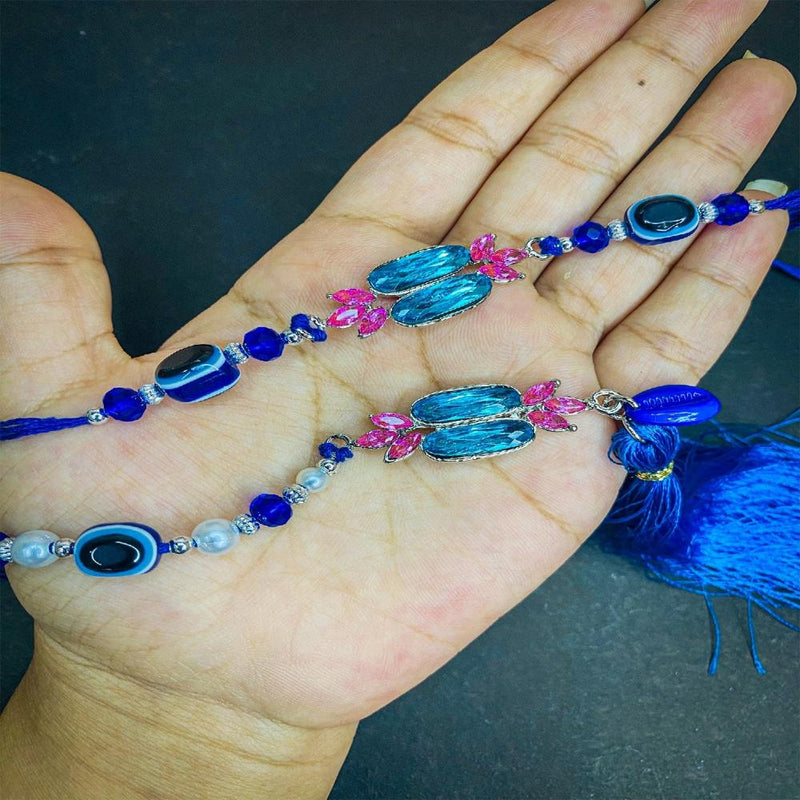 Mahi Simple and Classic Blue Crystals and Evil Eye Lumba and Brother Rakhi Set for Bhaiya and Bhabhi (RCOL1105673R)