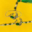 Mahi Peacock-Shaped Green Crystals Lumba with Tassel and Brother Rakhi Set for Bhaiya and Bhabhi (RCOL1105683RGre)